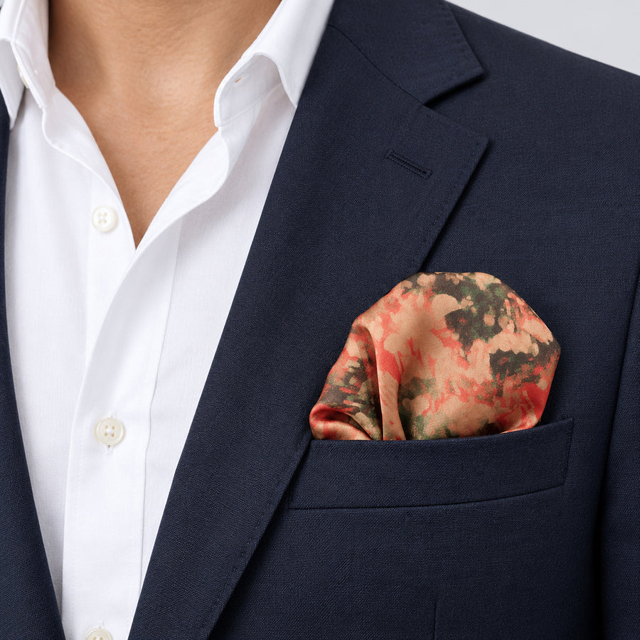 Abstract Floral pocket square — navy jacket · wearing detail.