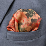 Abstract Floral pocket square — close-up wearing detail.