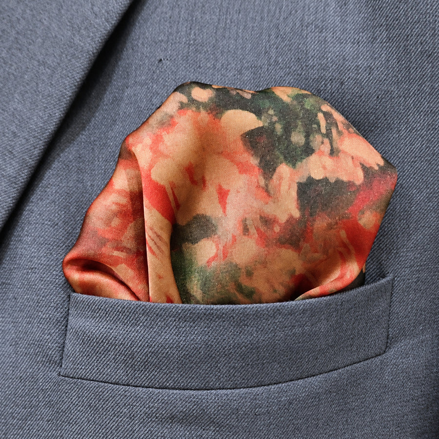 Abstract Floral pocket square — close-up wearing detail.