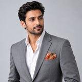 Abstract Floral pocket square — model · light grey and open collar.