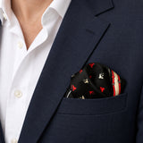 Abstract Horse pocket square — navy jacket · wearing detail.