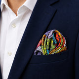 Abstract Matrix pocket square — navy jacket · alternate fold.