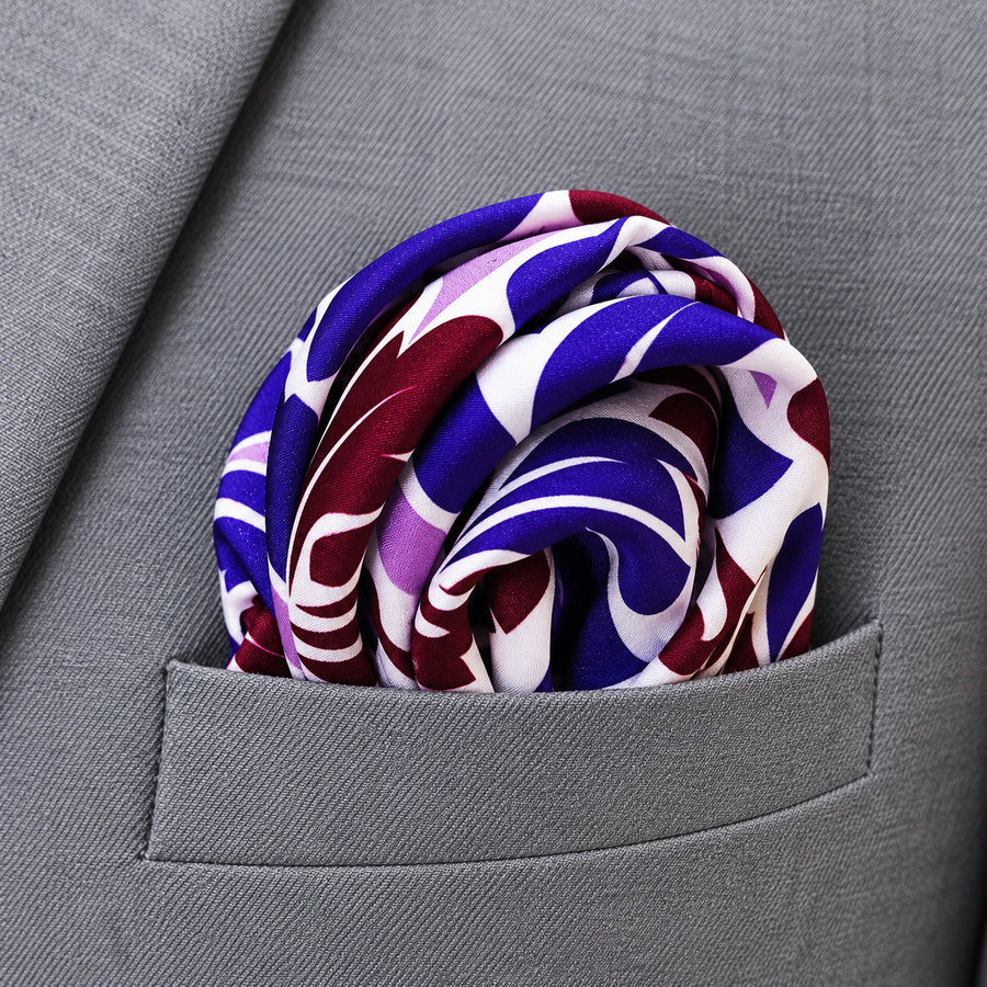 Antique Abstract pocket square with purple, lavender and burgundy acanthus print on white — close-up wearing detail.