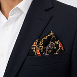 Ball Chain Art pocket square — navy jacket · alternate fold.