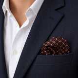 Chocolate HoneyComb pocket square — navy jacket · wearing detail.