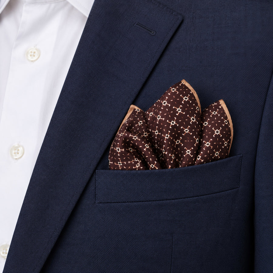 Chocolate HoneyComb pocket square — navy jacket · alternate fold.