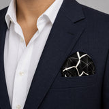 Black and White Hexagonal pocket square — navy jacket · wearing detail.
