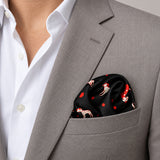 Black Dalmatian pocket square — light jacket · wearing detail.