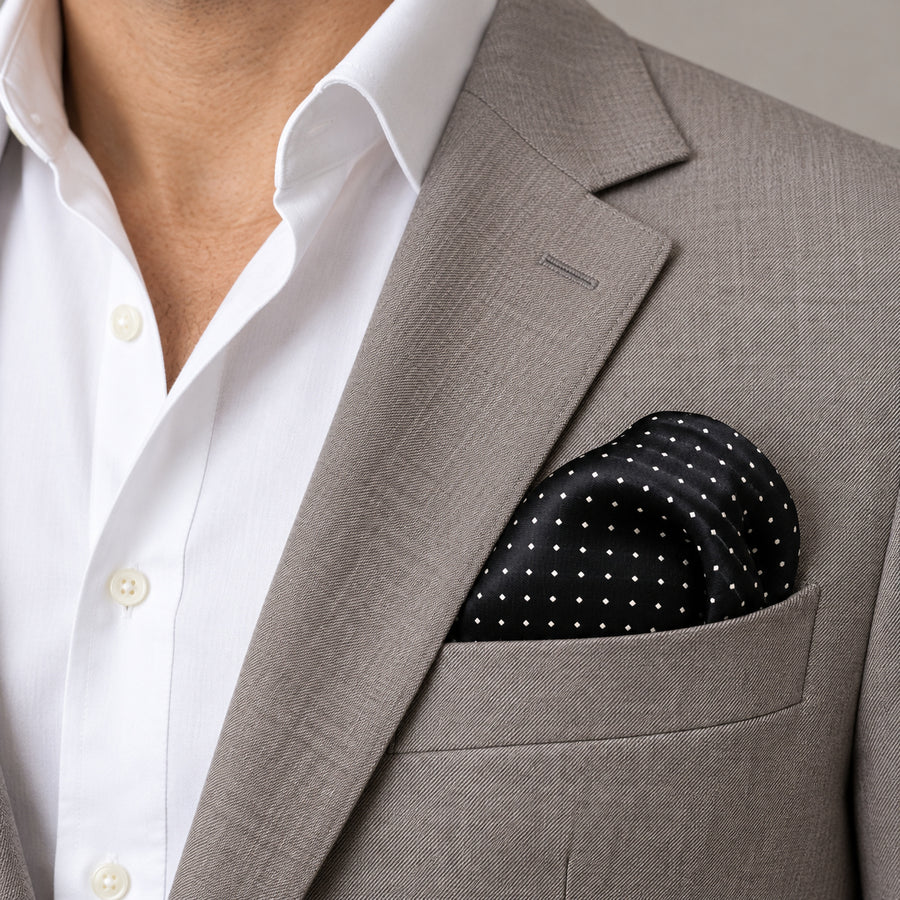 Black Dot Polka pocket square — light jacket · wearing detail.