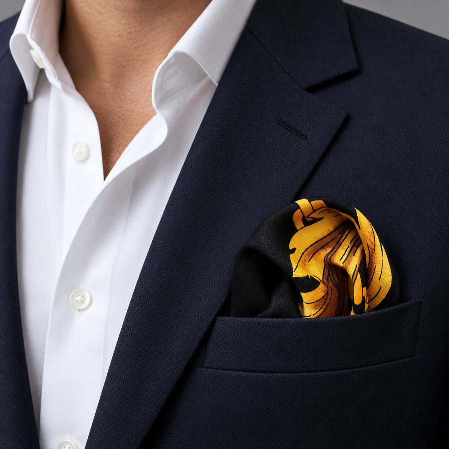 Black & Gold Chain Pattern pocket square — navy jacket · wearing detail.