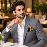 Black & Gold Chain Pattern pocket square — restaurant lifestyle.
