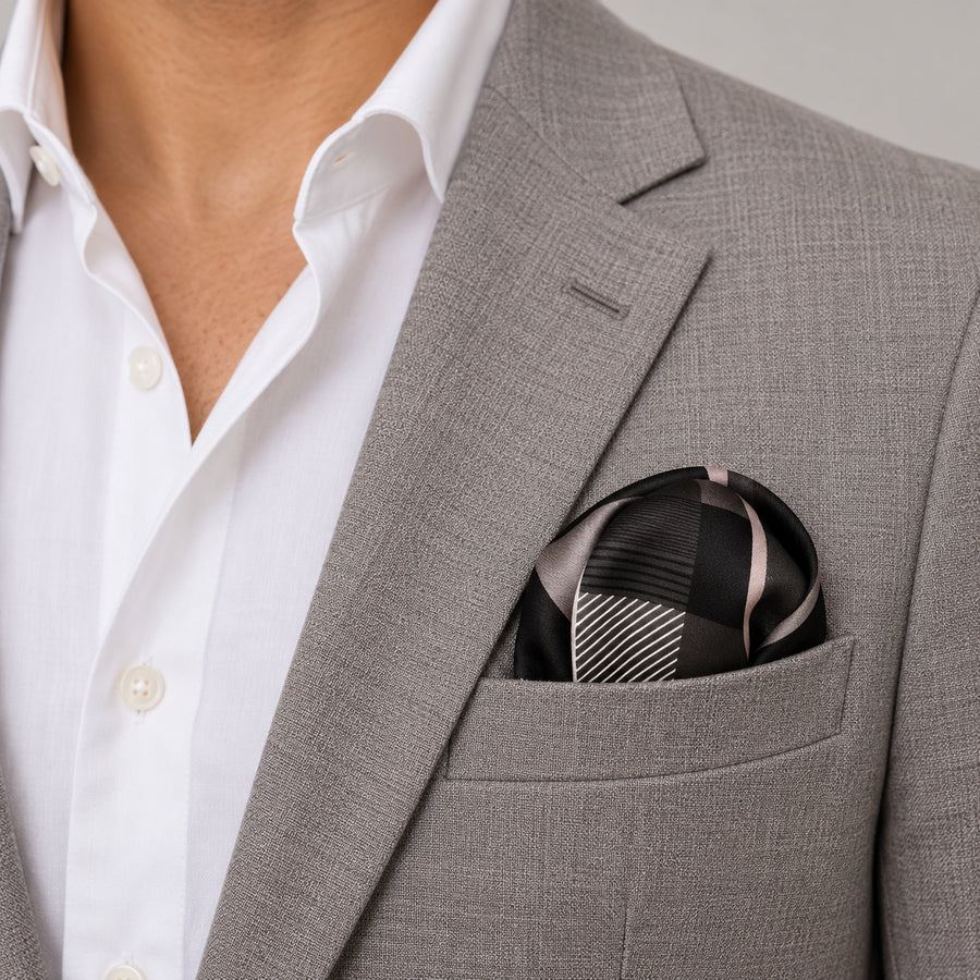 Black & White Abstract pocket square — light jacket · wearing detail.