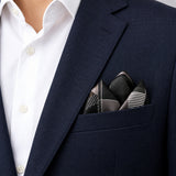 Black & White Abstract pocket square — navy jacket · alternate fold.