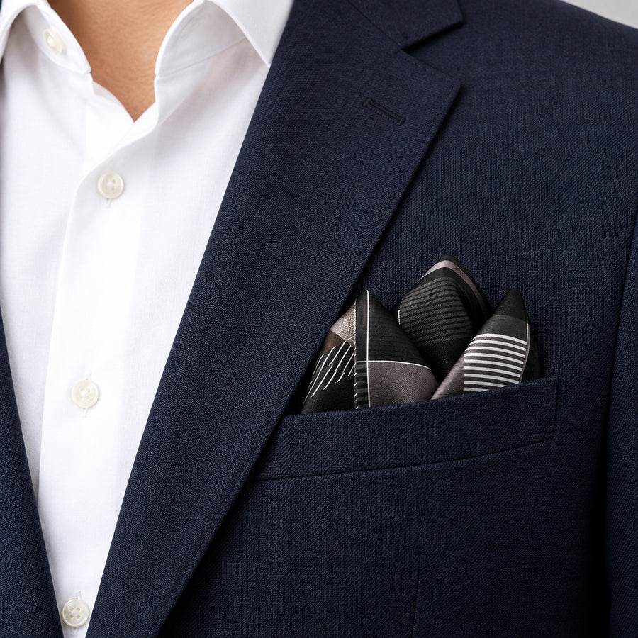 Black & White Abstract pocket square — navy jacket · alternate fold.