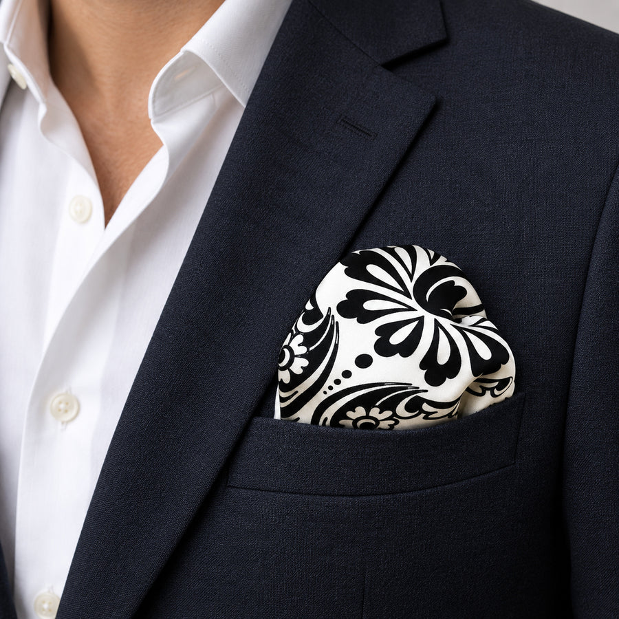 BLACK & WHITE TURKISH FLORAL SILK POCKET SQUARES pocket square — navy jacket · wearing detail.