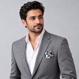BLACK & WHITE TURKISH FLORAL SILK POCKET SQUARES pocket square — model · light grey and open collar.