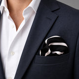 Black with White Stripes pocket square — navy jacket · wearing detail.