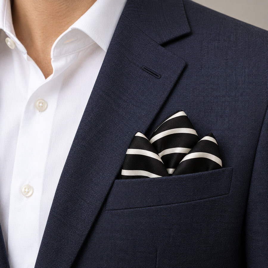 Black with White Stripes pocket square — navy jacket · alternate fold.