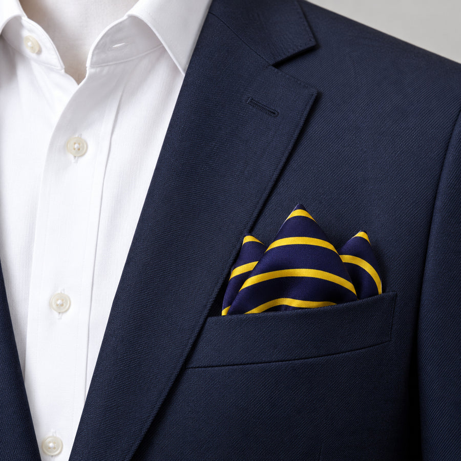 Blue and Gold Stripes pocket square — navy jacket · alternate fold.