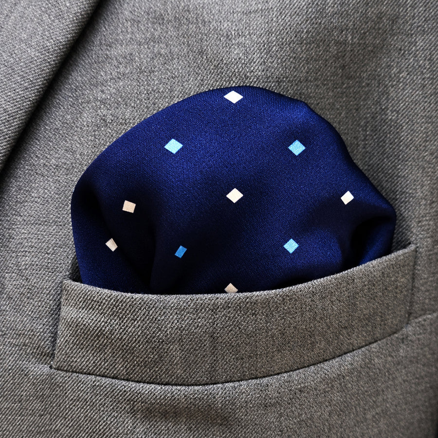 BLUE MULTI DOTTED SIlk Pocket Square pocket square — close-up wearing detail.