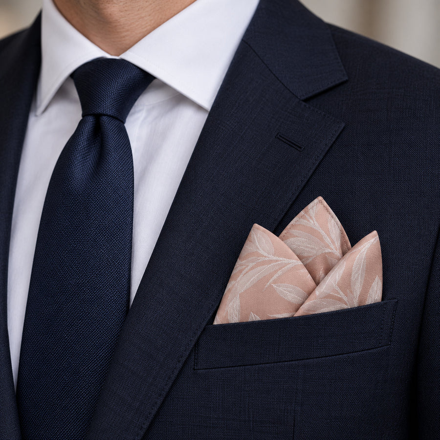 Blush Laurel Leaf Silk Pocket Square — navy jacket · pointed fold.