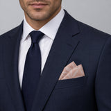 Blush Laurel Leaf Silk Pocket Square — formal model · navy and tie.