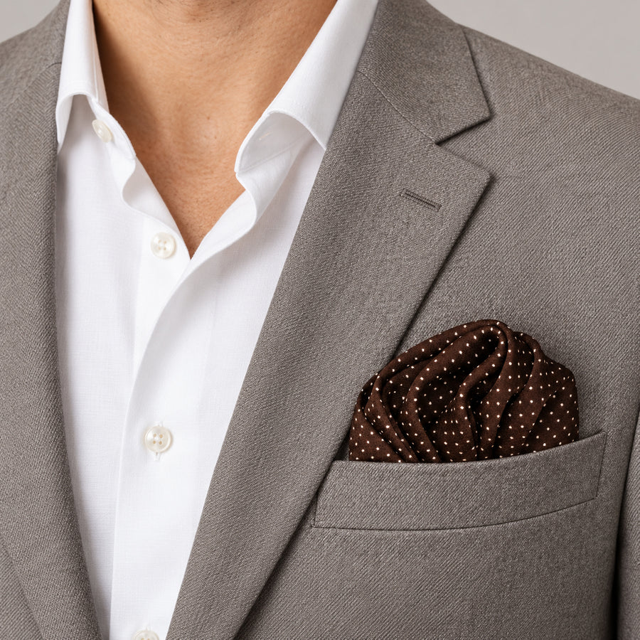 Brown Dot Polka pocket square — light jacket · wearing detail.