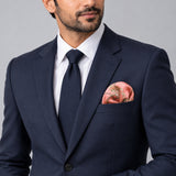 Chain Me Up pocket square — formal model · navy and tie.
