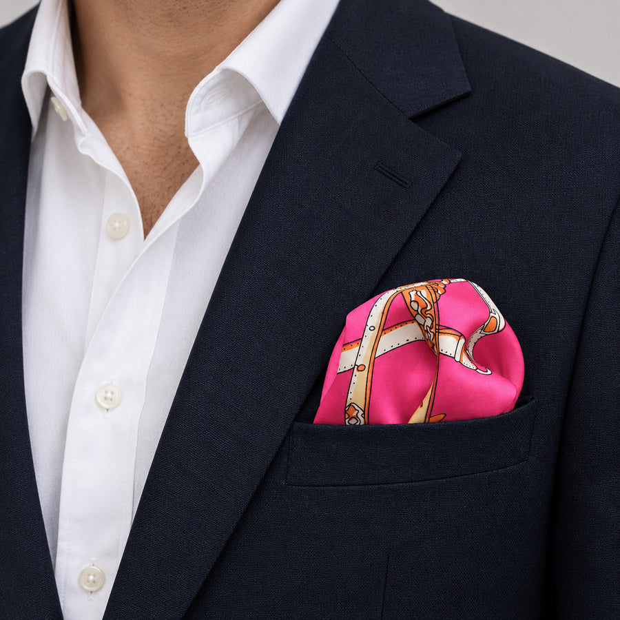 Chains and Straps (Pink) pocket square — navy jacket · wearing detail.
