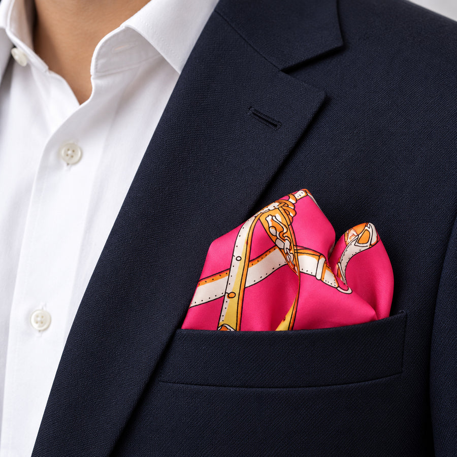 Chains and Straps (Pink) pocket square — navy jacket · alternate fold.