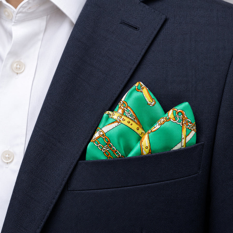 Chains and Straps (Sea Green) pocket square — navy jacket · alternate fold.