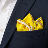 Chains and Straps (yellow) pocket square — navy jacket · alternate fold.