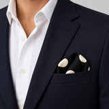 Black and White Jumbo Polka Dots pocket square — navy jacket · wearing detail.