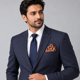 Coral Sands Polka Dot pocket square — formal model · navy and tie.