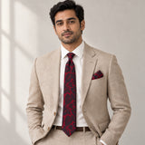Crimson Leaf Silhouette silk tie and matching pocket square — Light beige · studio portrait