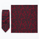 Crimson Leaf Silhouette silk tie and matching pocket square — Full square · overhead pair