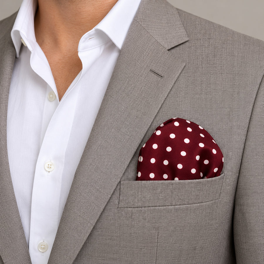 Dark Maroon with White Polka Dots pocket square — light jacket · wearing detail.