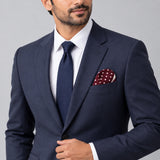 Dark Maroon with White Polka Dots pocket square — formal model · navy and tie.