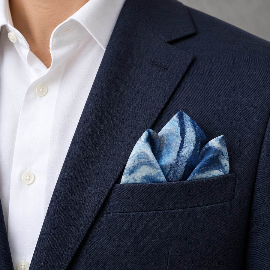 Deep Blue Ocean pocket square — navy jacket · alternate fold.