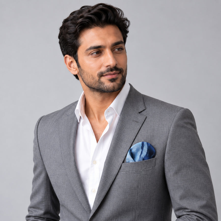 Deep Blue Ocean pocket square — model · light grey and open collar.