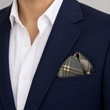 Dusty Grey Tartan Checks pocket square — navy jacket · wearing detail.