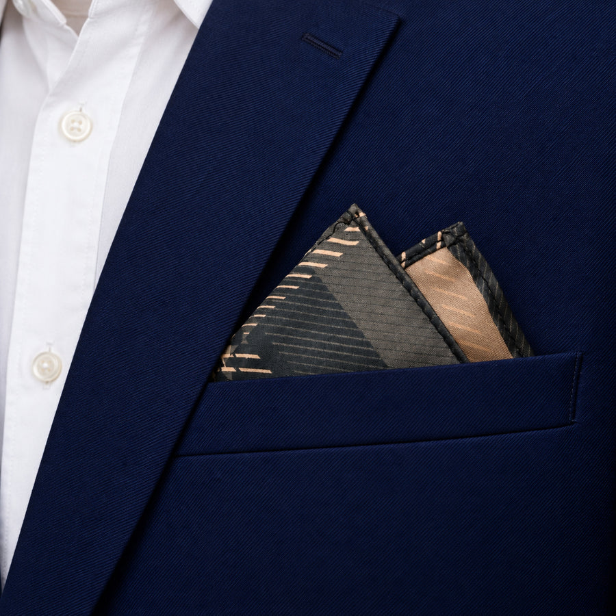 Dusty Grey Tartan Checks pocket square — navy jacket · alternate fold.