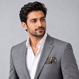 Dusty Grey Tartan Checks pocket square — model · light grey and open collar.