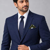 Forest Polka Dots pocket square — formal model · navy and tie.