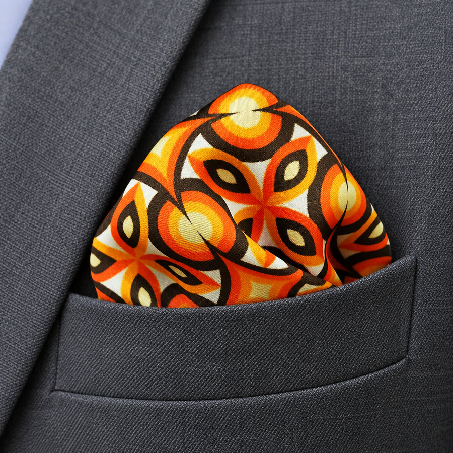 Geometric Repeat Pattern pocket square — close-up wearing detail.
