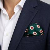 Green and Gold Reversible pocket square — navy jacket · wearing detail.
