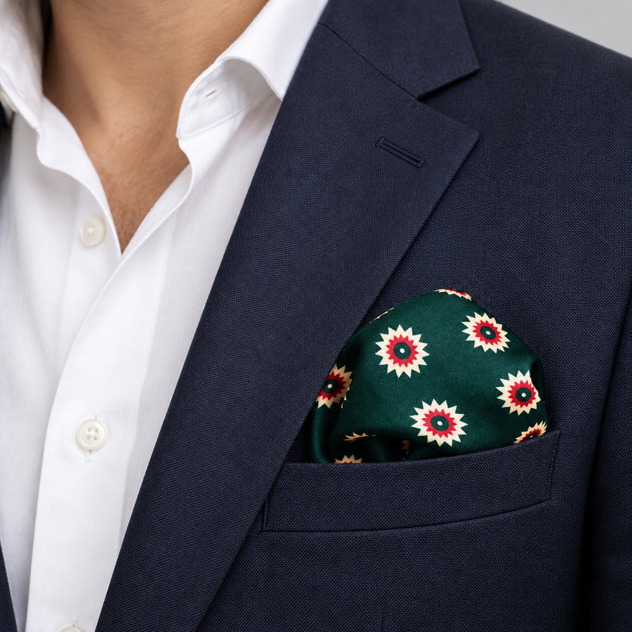 Green and Gold Reversible pocket square — navy jacket · wearing detail.