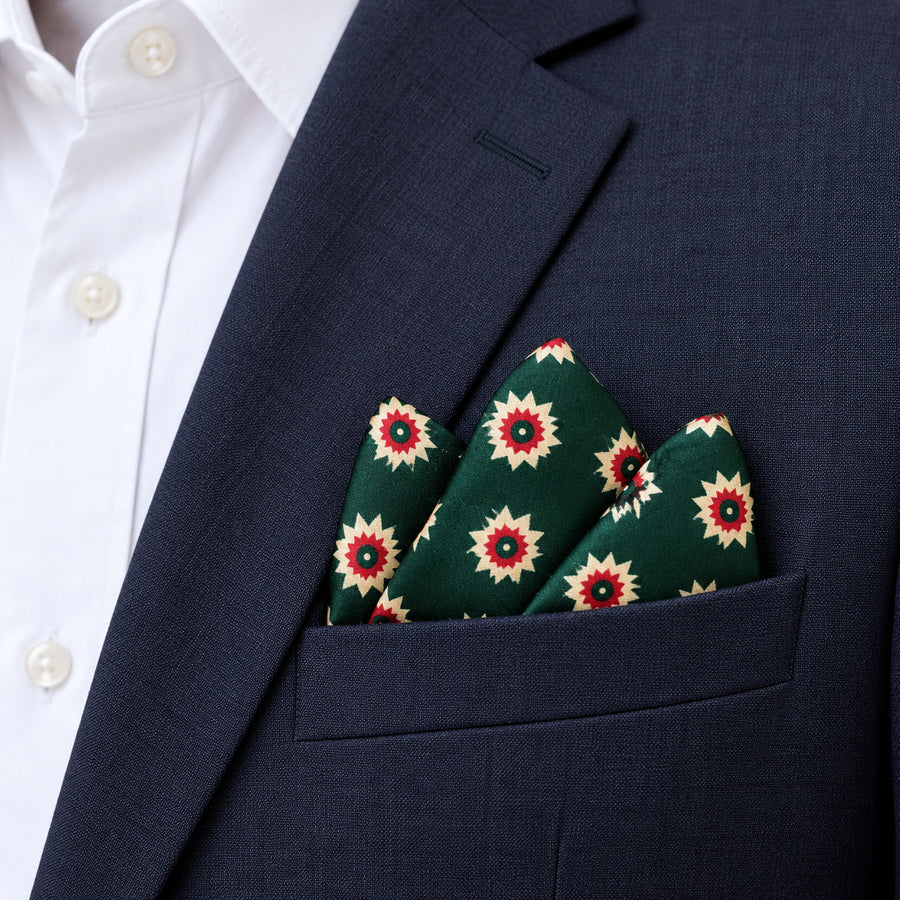 Green and Gold Reversible pocket square — navy jacket · alternate fold.