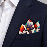 Hawaiian Flower pocket square — navy jacket · alternate fold.