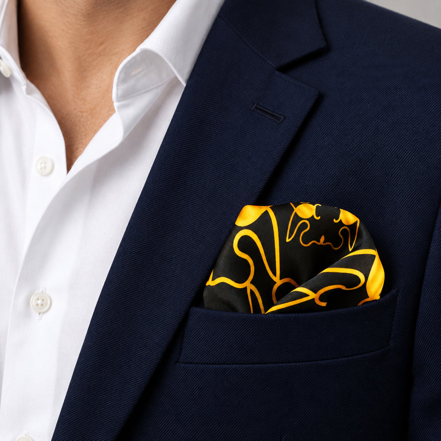 Golden Reverie pocket square — navy jacket · wearing detail.